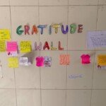 Expressing thankfulness and positive reflections Students viewing and contributing to the Gratitude Wall at The Orchids Public School